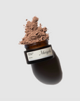Picture of the blueberry rose facial mask open showing the brown powder inside.