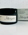 Merigold blueberry facial mask in a black jar closed and blue box.