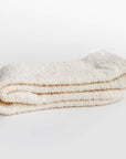 Our signature cloud socks are ivory in color side image shown on a white background.
