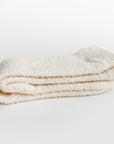 Our signature cloud socks are ivory in color side image shown on a white background.