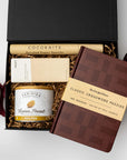 Gift set with crossword puzzle book, coconut candies, and a card on a white background