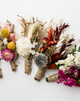 5 dried floral bundles on a white background.