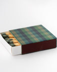 plaid matchbox is featured with plaid design on the cover opened with green tip matches on a white background.