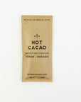 Hot cacao hot chocolate from retreat drinks packet, beige colored with information in black lettering.