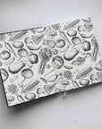 Paste down and front end paper image of green recipe book.