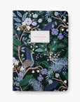 Peacock notebook one, black with peacock illustration with white label and gold lettering on white background.