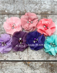 Personalized flower girl chiffon flower color options in a wooden background.