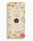 sugarfina hazelnut crèpe chocolate bar packaging with floral design