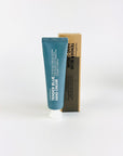 tender blue hand lotion with it's brown box and blue tube standing up.