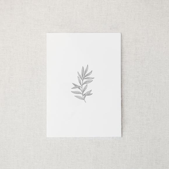 White card with grey botanical branch in center