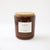 8 oz chai scented soy candle, approx 3.25" x 3.75", brown glass container with cork lid and white sticker. Pictured with dried autumn themed florals
