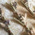 multiple dried floral bundles spaced out shown on white background