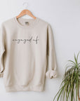 Custom Bride-to-Be Engagement or Bachelorette Sweatshirt with "engaged af" in lowercase script across chest, on white background with a green plant next to it.