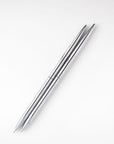Two minimalist silver pens that have a round shape are featured on a white background.