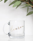 Personalized glass mug, transparent personalized in gold lettering with the name Lauren.