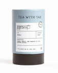 Peppermint Tea Mini Tube, a light-gray cylindrical container holds peppermint tea, featuring a label with product details.