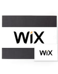 A black 'foxblossom' box with a white 'wix' belly band, and a white card with the same 'wix' graphic printed on front.