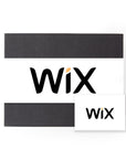 A black 'foxblossom' box with a white 'wix' belly band, and a white card with the same 'wix' graphic printed on front.