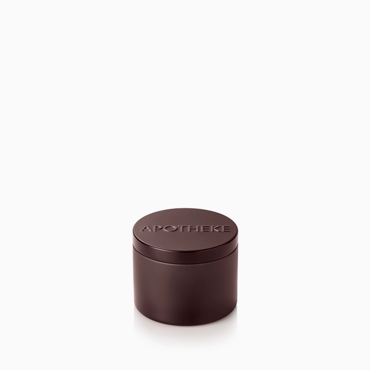 A small cylindrical dark brown apothecary jar with a matching lid, featuring the brand name 'APOTHEKE' embossed on top, set against a plain white background.