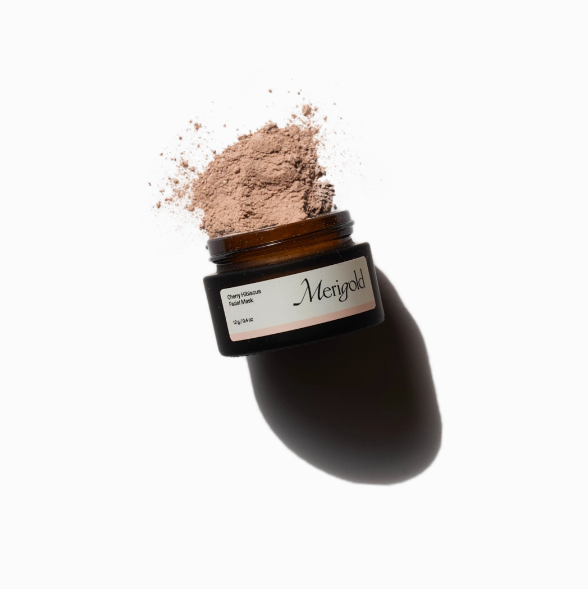 Image of Merigold facial mask Cherry Hibiscus brown jar and powder. 