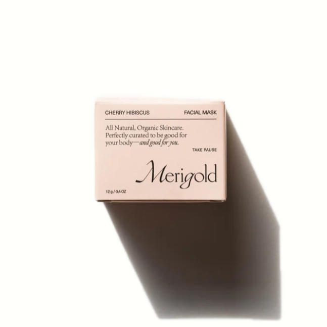 Cherry Hibiscus Facial Mask box, pink box with black lettering. 