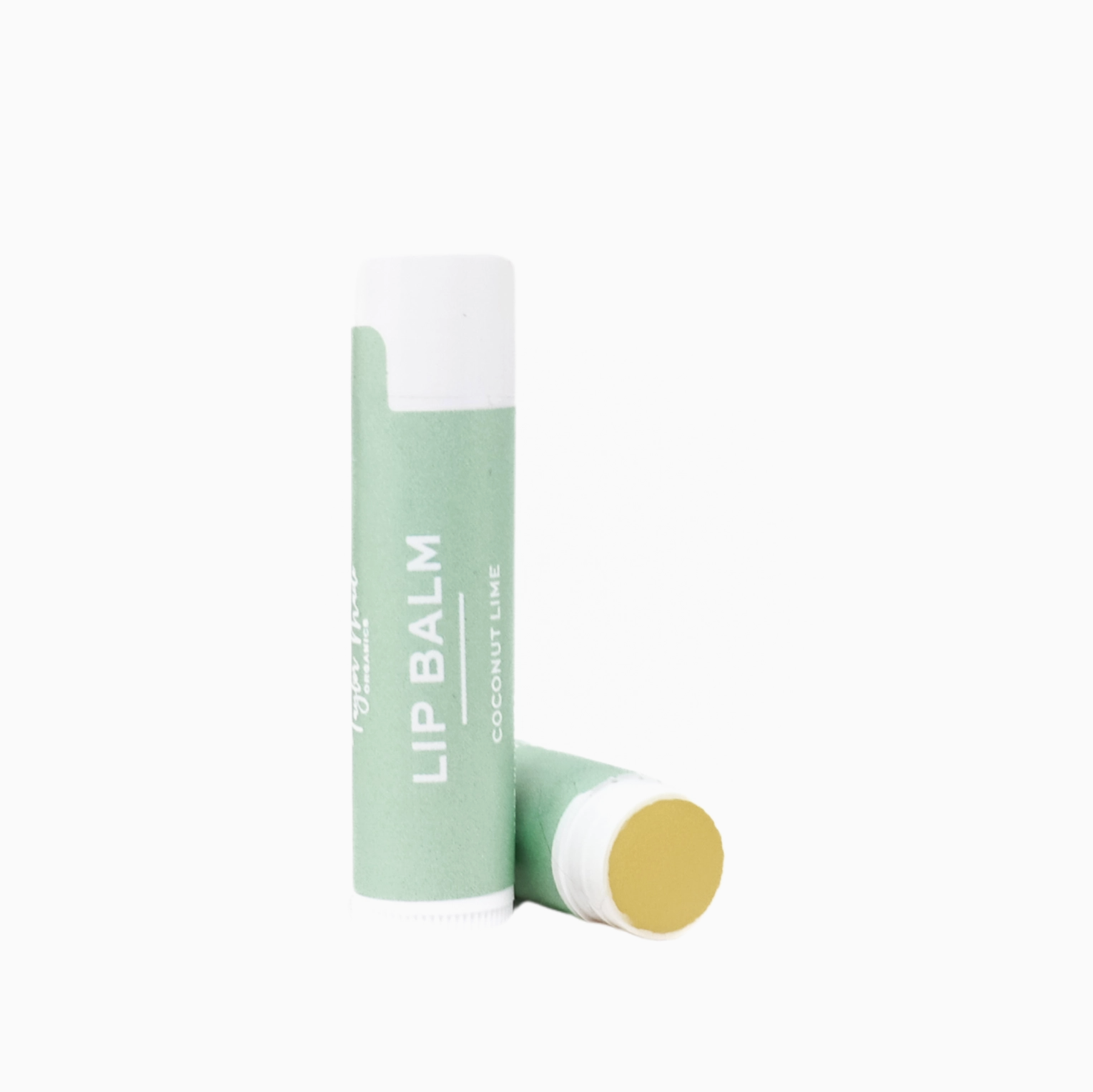 Taylor Made Organics Coconut-Lime Lip Balm in a natural light greeen twist-up tube with coconut-lime themed label.