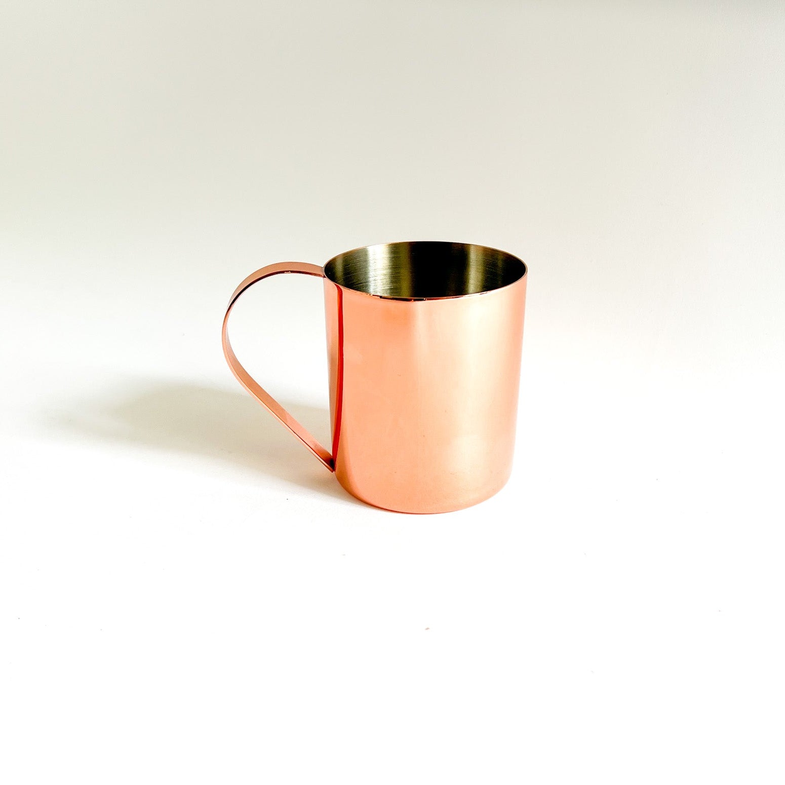 Stainless steel copper-plated Moscow mule mug on a white background.