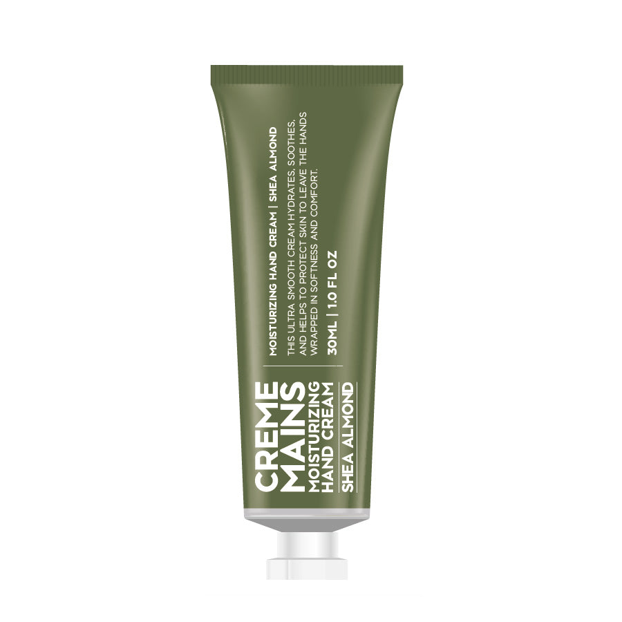 Creme mains shea almond hand creme is featured on its dark green tube container and white lettering on a white background. 