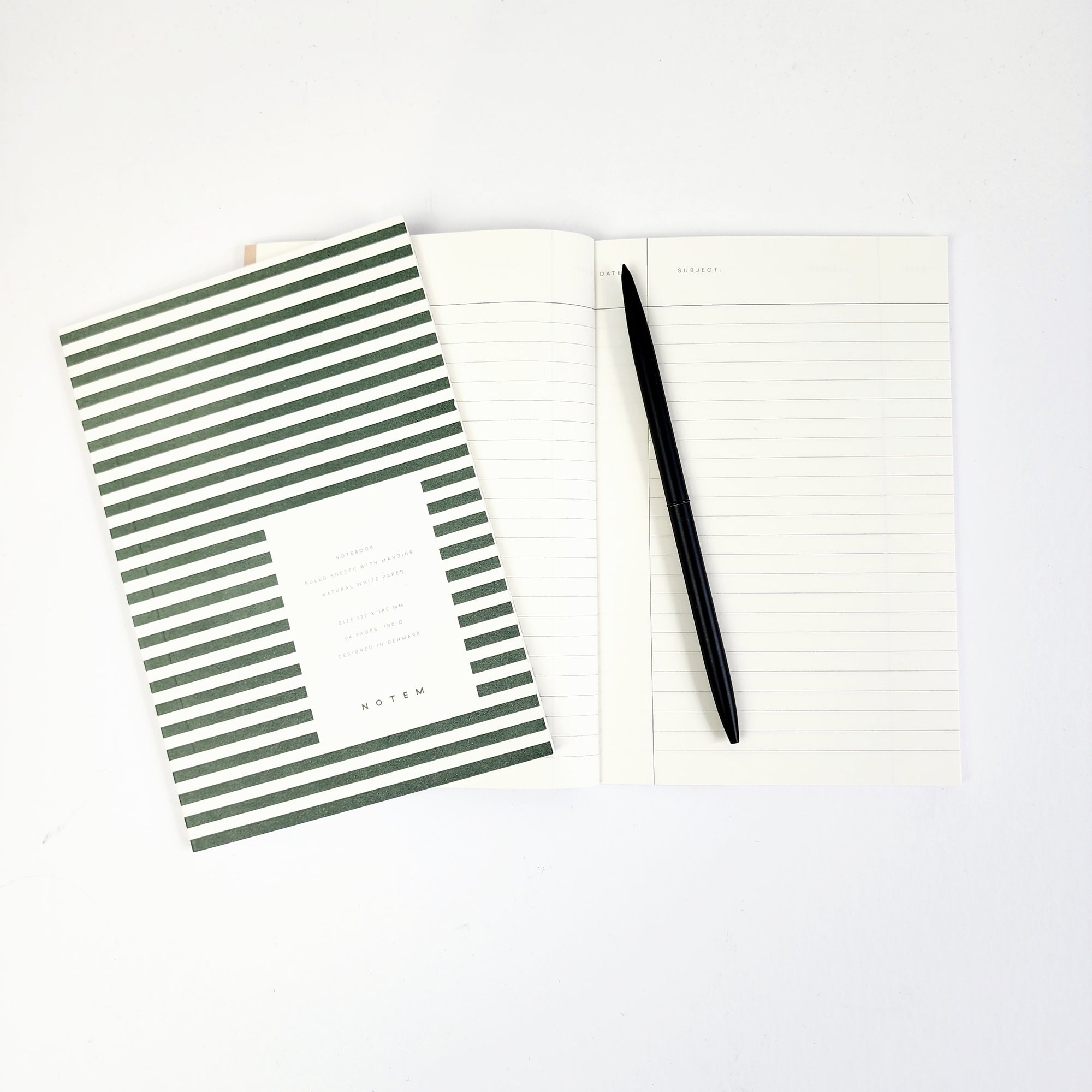 dark green striped pocket notebook opened. 