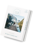  Deck of calm  featured, the image is the "Calm Club" deck of cards,  The front of the box displays an image of a person meditating on a wooden dock overlooking a calm lake, mountains in the background, which is meant to evoke tranquility. With text overlayed on the image describing the product name and the number of ways to achieve calm. The side of the box showcases the product's description and purpose. 