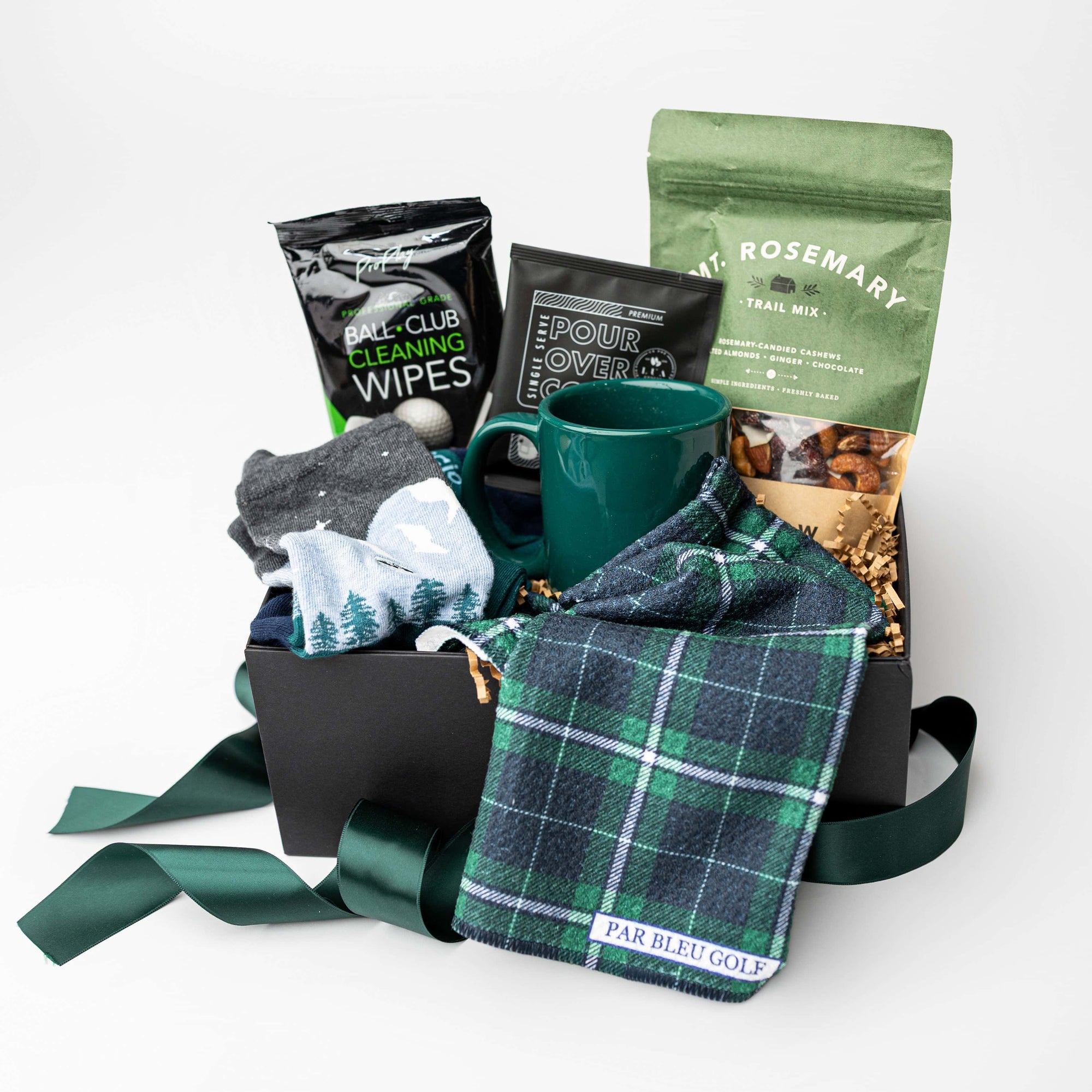 Gift basket with green and plaid elements on a white background