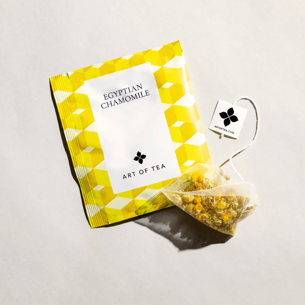 Egyptian Chamomile tea package with a tea bag on a light gray background
