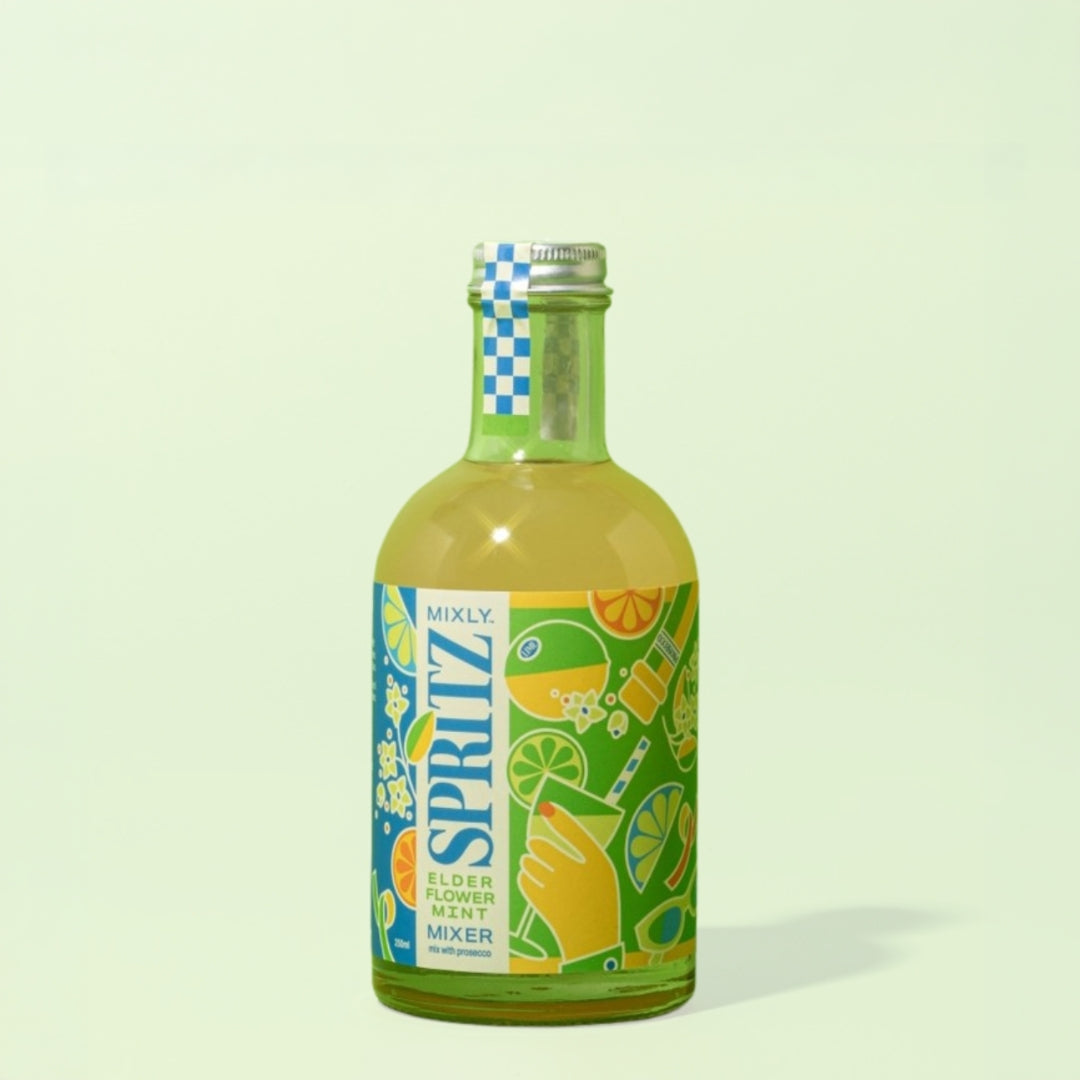 Bottle of Spritz mixer with colorful label on a light green background