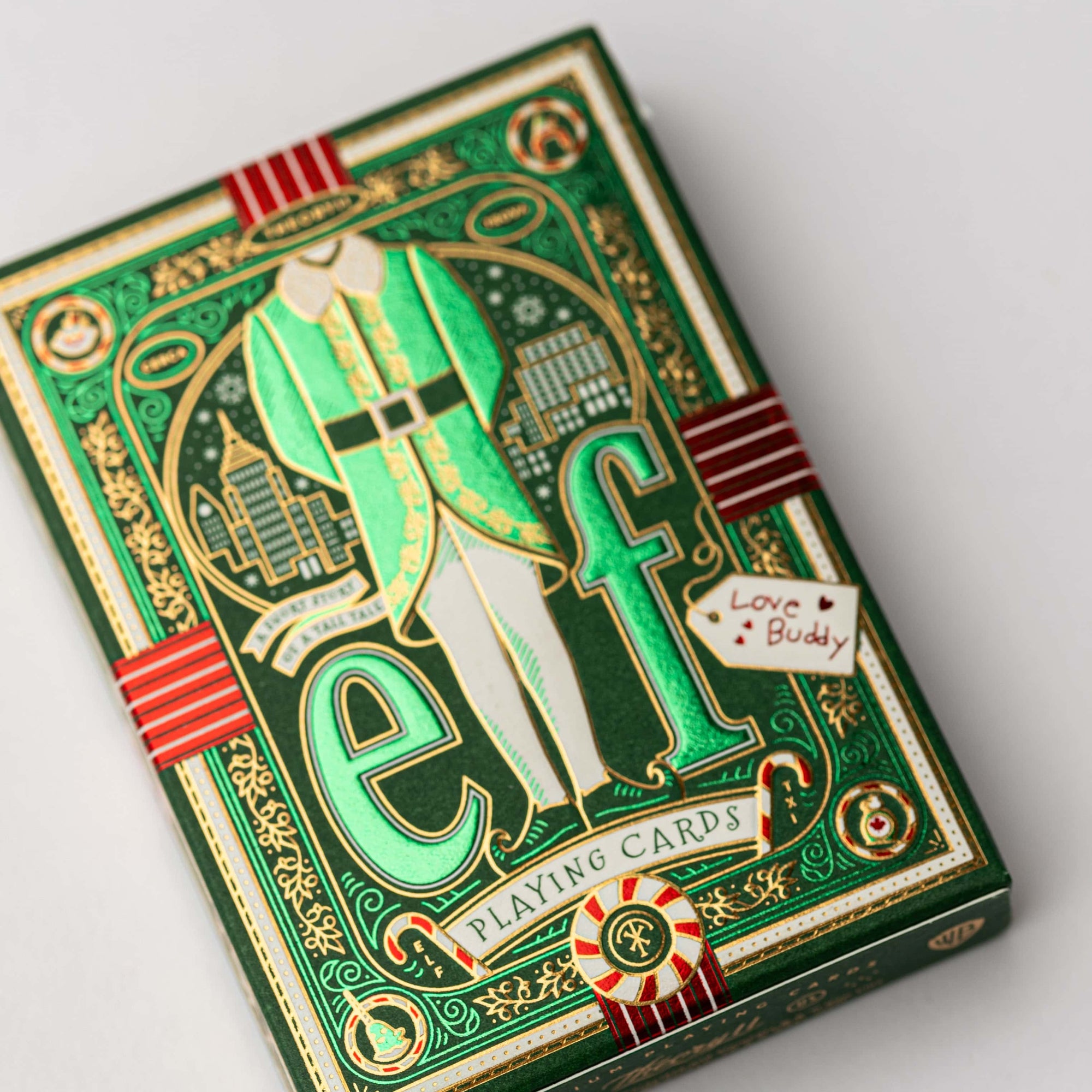 Elf themed playing cards deck with illustrated holiday characters.