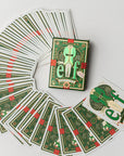 Elf themed playing cards deck with illustrated holiday characters.