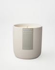 Candle with a label on a white background