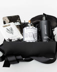 Gift basket with black ribbon on a white background
