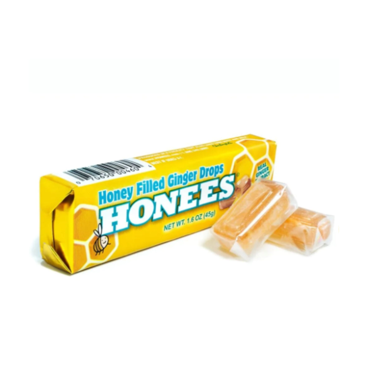 Honees Honey Filled Ginger Drops in bright yellow packaging, displayed on a clean white background. The package is standing upright with two honey-filled ginger drops placed beside it, showcasing their warm golden honey color and smooth texture.