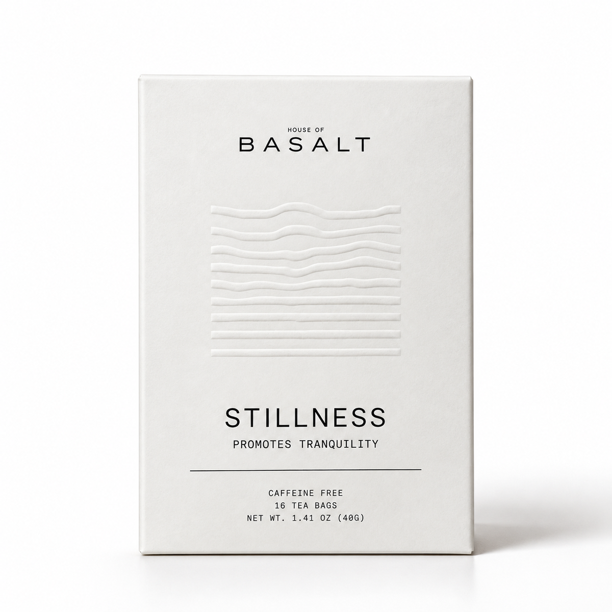 A white rectangular box of House of Basalt Stillness tea, featuring minimalist black typography and a subtle embossed wavy pattern on the front, set against a clean white background.