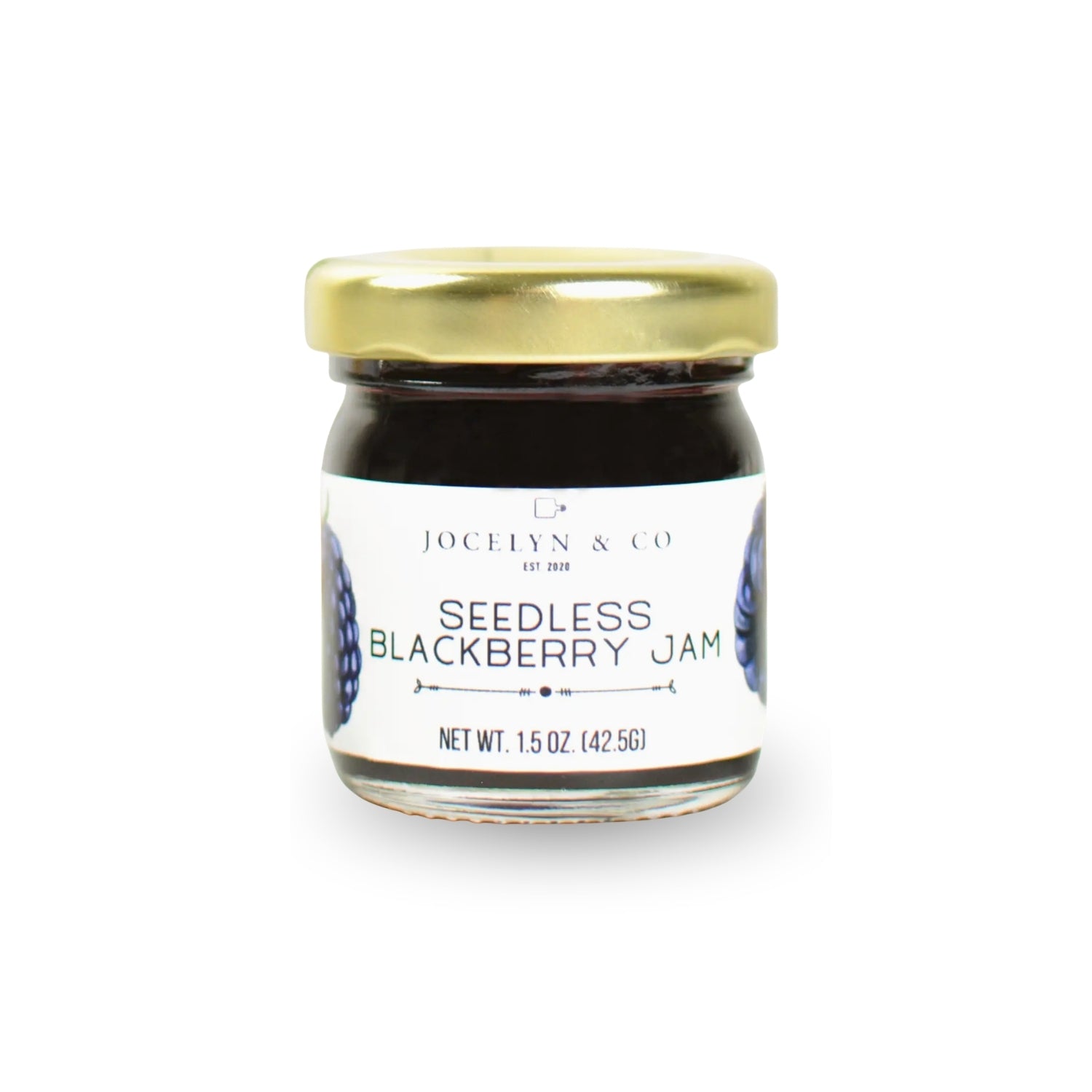 Jar of seedless blackberry jam with gold lid on a white background