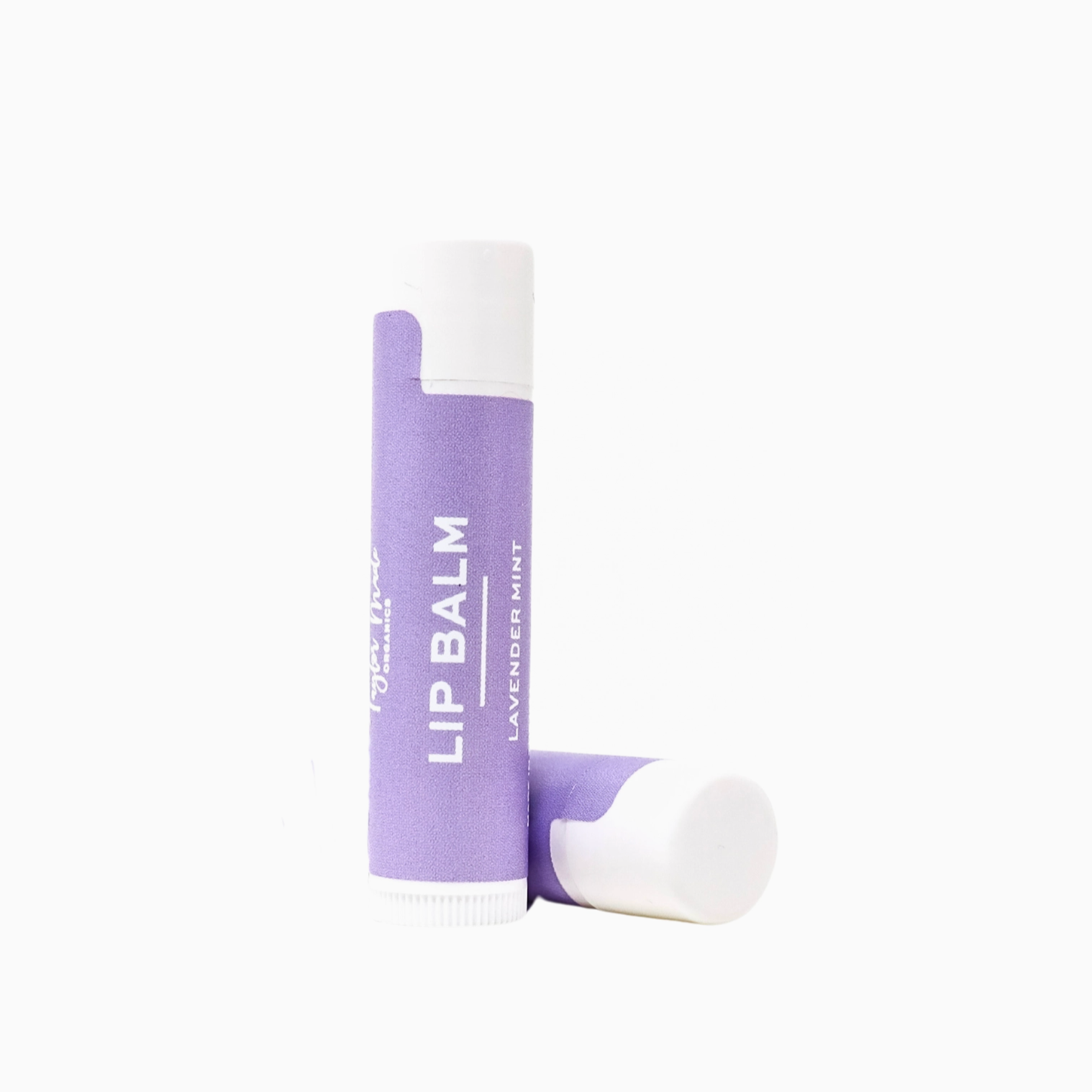 Lip balm with purple packaging on a white background