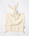 Organic bunny blanket in beige color on a white background. 
