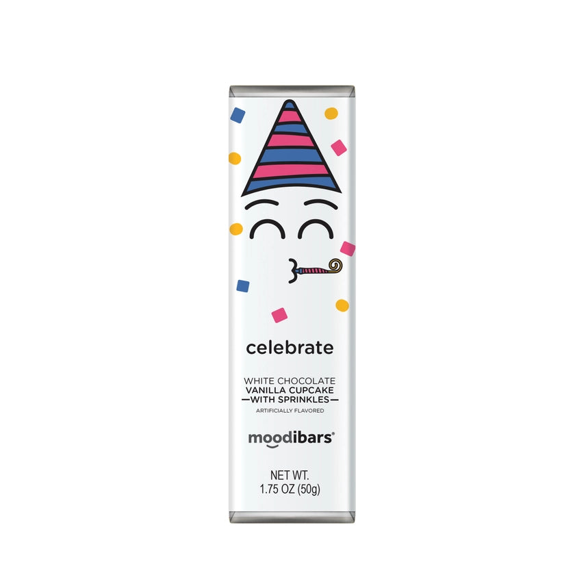 Celebrate white chocolate bar is featured , featuring a celebration-themed graphic, a cartoon face wearing a party hat and party horn and surrounded by colorful confetti, expressing a celebratory mood. The text indicates it is white chocolate with vanilla cupcake flavor and sprinkles. The Moodibars logo and the product's net weight are also displayed in a smaller font in black.