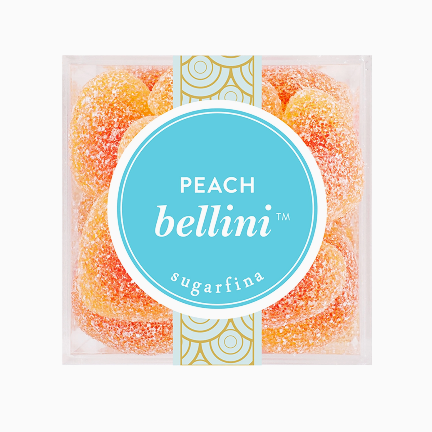 Sugarfina Peach Bellini Gummies in a clear plastic cube-shaped package, showing peach-colored gummy candies inside, each shaped like miniature bottles, with the Sugarfina logo and 'Peach Bellini' label on the front on a white background. 