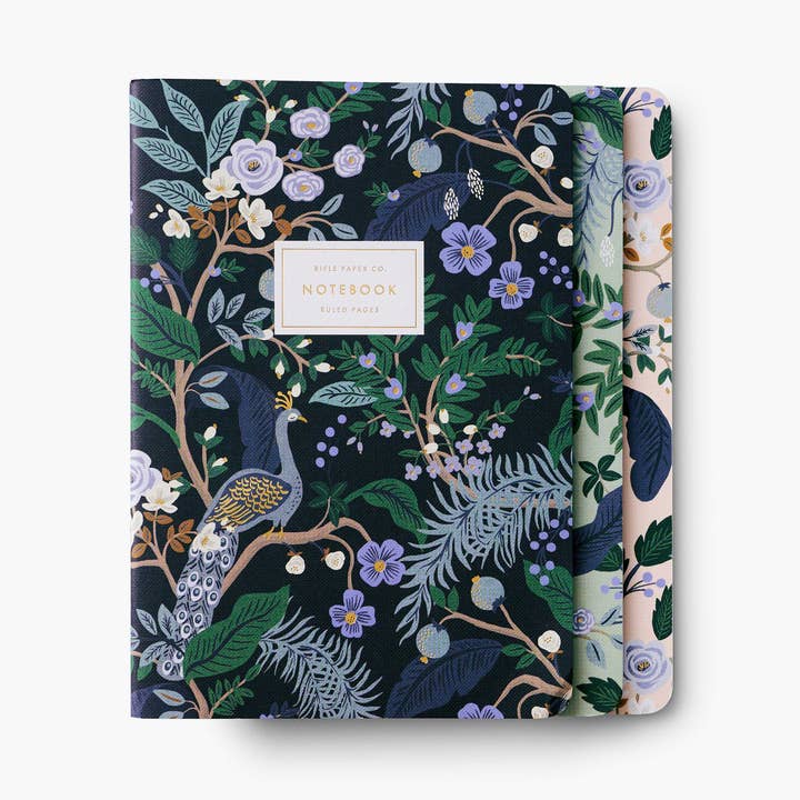 Peacock notebooks set of three is featured, black, mint green, and pink with peacock illustrations on a white background. 