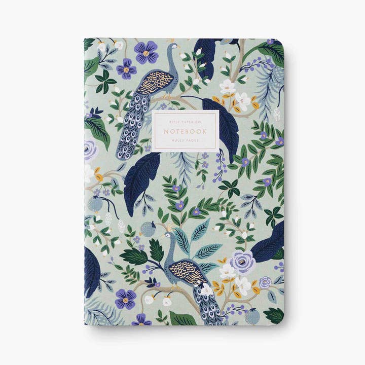 Peacock notebook number 2 in mint green with peacock illustration with a white label with gold lettering.  
