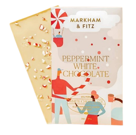 Peppermint White Chocolate, image shows the chocolate wrapping that has a background of three colorful people with peppermint candy and a hand holding a mug, and the label is in gold lettering. Also shows the candy bar with peppermint candy pieces. 