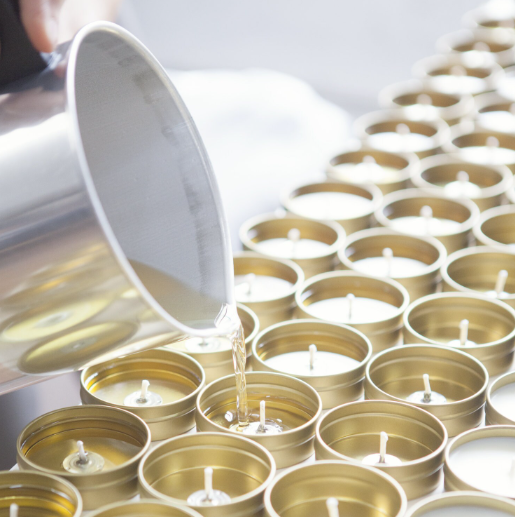 Personalized candle wedding favor in the making shown in the image.