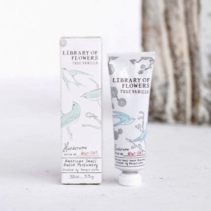 Petit Treat Hand Cream- True Vanilla, in white box with three blue birds with black letters. 