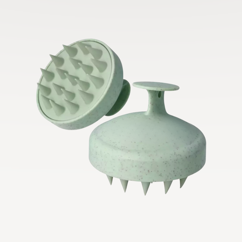 Side and bottom image of scalp massager is featured on a white background. 